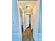 Hallway view featuring neutral walls, and multiple doorways at 1718 Fallston Rd, Shelby, NC 28150