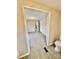 Hallway view featuring neutral walls and wood-look flooring at 1718 Fallston Rd, Shelby, NC 28150