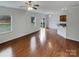 Living room has hardwood floors, natural light, and open layout at 1805 Palazzo Dr, Waxhaw, NC 28173