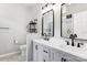 This bathroom features a double sink vanity, updated fixtures, and toilet at 1836 Danny Ct, Matthews, NC 28105