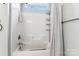 Bathroom featuring a shower and bath combination with storage caddy at 1836 Danny Ct, Matthews, NC 28105