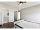 This bedroom features a neutral color palette, wood floors and access to an adjoining bath at 1836 Danny Ct, Matthews, NC 28105