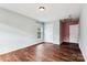 Bedroom featuring dark wood floors and a light blue painted walls at 1836 Danny Ct, Matthews, NC 28105