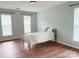 Bright bedroom features natural light and a comfortable bed with a soft quilt at 1836 Danny Ct, Matthews, NC 28105