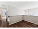 Hallway with dark floors and bright lights at 1836 Danny Ct, Matthews, NC 28105
