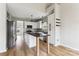 Modern kitchen featuring stainless steel appliances, an island, and eat in dining at 1836 Danny Ct, Matthews, NC 28105