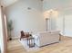 Open-concept living room featuring natural light, hardwood floors, and neutral decor at 1836 Danny Ct, Matthews, NC 28105