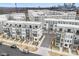 An aerial view of modern townhomes with stylish architecture and well-kept landscaping in the community at 1925 Dunavant St, Charlotte, NC 28203