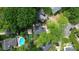 Aerial view of property featuring backyard pool, patio, and landscaped grounds at 3516 Mill Stream Ct, Charlotte, NC 28209