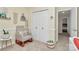 Comfortable bedroom with neutral carpet, and a chair with rocking base near closet at 3516 Mill Stream Ct, Charlotte, NC 28209