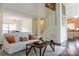 Bright living room featuring hardwood floors, neutral decor, and an open floor plan at 3516 Mill Stream Ct, Charlotte, NC 28209