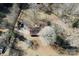 Bird's eye view of a secluded property with lush greenery and a winding driveway in a wooded area at 4730 16Th Street Ne Dr, Hickory, NC 28602