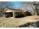 Cozy single-story home with a covered carport, neat landscaping, and a welcoming porch at 4730 16Th Street Ne Dr, Hickory, NC 28602