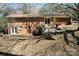 The back of the house features access to a brick patio area and basement with french doors at 4730 16Th Street Ne Dr, Hickory, NC 28602