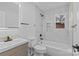 Modern bathroom features a marble tiled shower, a new vanity, and black fixtures at 515 Richards Rd, Chester, SC 29706
