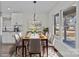Bright dining room with elegant table setting, stylish lighting, and a view of the backyard at 515 Richards Rd, Chester, SC 29706