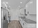 Modern kitchen with white cabinets, stainless steel appliances, and sleek countertops at 515 Richards Rd, Chester, SC 29706