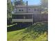 View of a two-story house showing a screened in back porch at 5516 Northwood Dr, Hickory, NC 28601