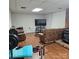Finished basement featuring wood laminate flooring, rec area, and a fireplace at 5516 Northwood Dr, Hickory, NC 28601
