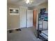 Neutral bedroom with closet and posters at 5516 Northwood Dr, Hickory, NC 28601