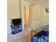 Bedroom featuring a TV, bed, and an open door at 5516 Northwood Dr, Hickory, NC 28601