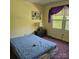Modest bedroom with window, side table, and decor at 5516 Northwood Dr, Hickory, NC 28601