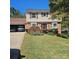 Charming two-story home with well-manicured lawn, brick accents, and an attached garage at 5516 Northwood Dr, Hickory, NC 28601