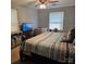 Primary bedroom featuring a large bed, neutral colors, and a window at 5516 Northwood Dr, Hickory, NC 28601
