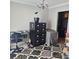 Office space featuring a patterned rug, file cabinet, and a desk with black chair at 5516 Northwood Dr, Hickory, NC 28601