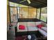 Relaxing screened-in porch with comfortable seating and views of the backyard at 5516 Northwood Dr, Hickory, NC 28601