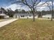 Charming ranch home featuring a classic brick exterior and a spacious front yard at 5680 Hillsdale St, Fort Lawn, SC 29714