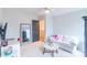 Bedroom featuring desk, chair, television, sofa, and coffee table at 605 Lumber Ln, Charlotte, NC 28214