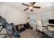 Comfortable bedroom with a ceiling fan, natural light, and neutral decor at 6830 Colonial Garden Dr, Huntersville, NC 28078