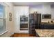 Gourmet kitchen featuring stainless steel appliances and built-in oven at 6830 Colonial Garden Dr, Huntersville, NC 28078