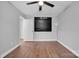 A well-lit bedroom featuring hard wood floors and a ceiling fan at 77 Timothy Dan Ln, Taylorsville, NC 28681