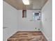 A laundry room featuring wood plank flooring and a wood ceiling at 77 Timothy Dan Ln, Taylorsville, NC 28681