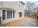 Enjoy outdoor living on this wood deck, perfect for relaxing and entertaining at 8137 Sheringham Way, Charlotte, NC 28227