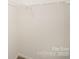 Walk-in closet with wire shelving provides ample storage space for an organized wardrobe at 8137 Sheringham Way, Charlotte, NC 28227