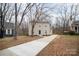 Charming two-story home with neutral siding, an extended driveway, and a well-maintained lawn at 8137 Sheringham Way, Charlotte, NC 28227