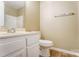 Light and bright bathroom with white vanity and wood-look flooring at 830 Wilcrest Ct, York, SC 29745