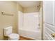 Bright bathroom features a tub-shower combination and a neutral color palette at 830 Wilcrest Ct, York, SC 29745