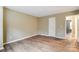 Bright bedroom features wood floors, neutral paint and a large closet at 830 Wilcrest Ct, York, SC 29745