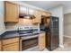 The well-appointed kitchen features stainless appliances and wood cabinetry at 830 Wilcrest Ct, York, SC 29745