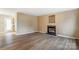 Bright living room features a fireplace, neutral walls and attractive floors at 830 Wilcrest Ct, York, SC 29745