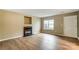 Spacious living room features neutral walls, a fireplace and attractive floors at 830 Wilcrest Ct, York, SC 29745