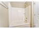 White tub shower features modern shower head and sleek design at 830 Wilcrest Ct, York, SC 29745