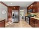 Well-equipped kitchen with stainless steel appliances, granite counters, and an open layout to the living area at 831 Spruce St, Charlotte, NC 28203