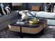 Living room with a dark wood coffee table and wicker accents at 9020 Northfield Crossing Dr, Charlotte, NC 28269