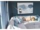 A blue living room with a comfy sofa at 9020 Northfield Crossing Dr, Charlotte, NC 28269