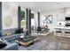 Stylish living room features a comfortable sofa, area rug, and ample natural light at 9020 Northfield Crossing Dr, Charlotte, NC 28269